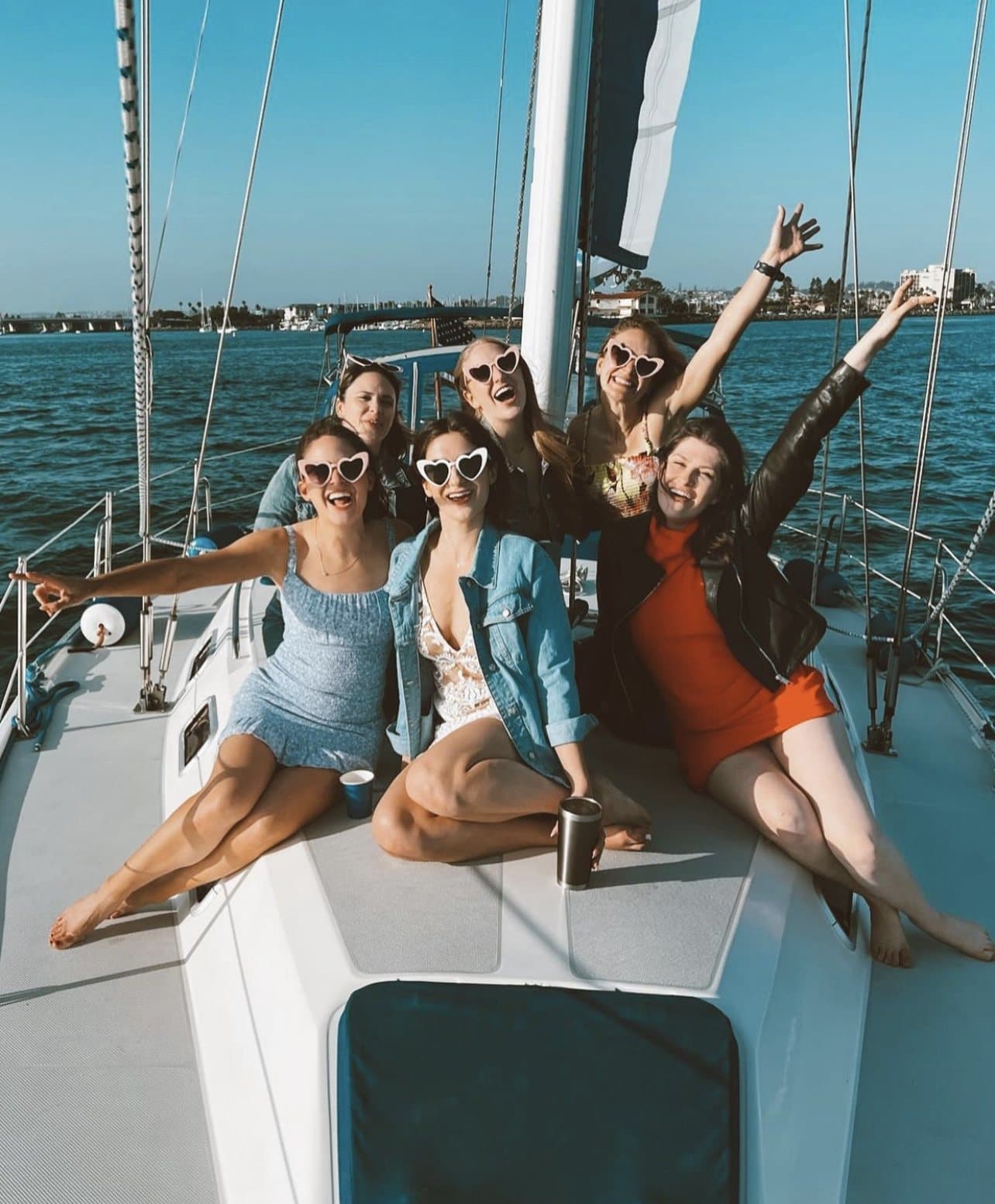 A group celebrating at golden hour on a private San Diego celebration charter